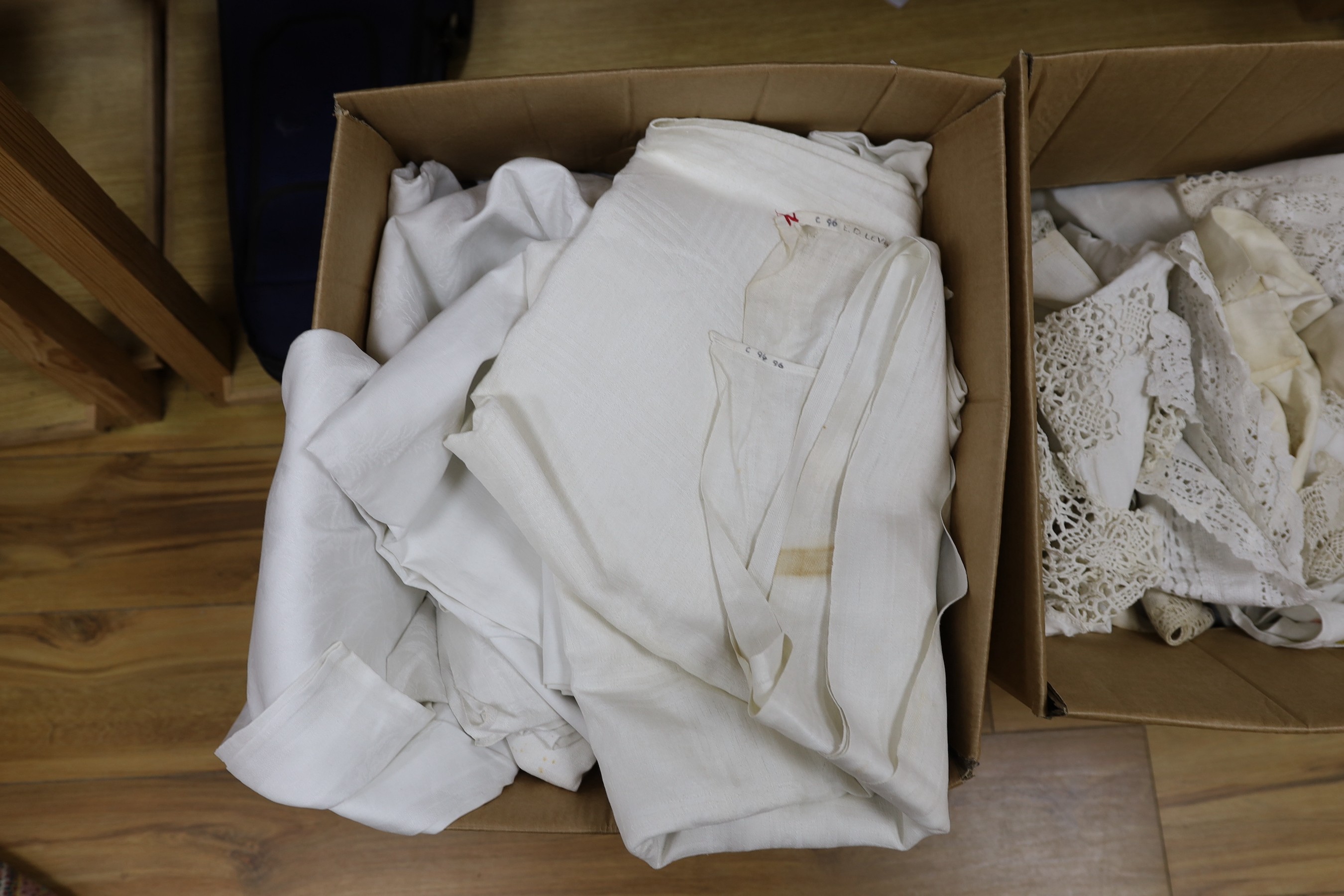 A 19th century Norwich shawl, together with mixed 20th century damask and crochet edged table cloths and linens
